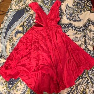 Hot pink flouncy dress.